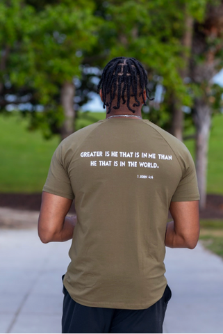 “GREATER IS HE” TEE